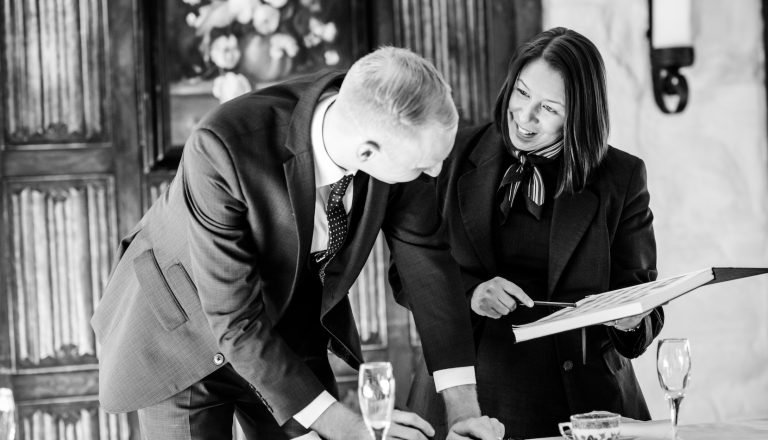Wedding coordinators at Holdsworth House discussing the details of a wedding at Holdsworth House in Halifax.