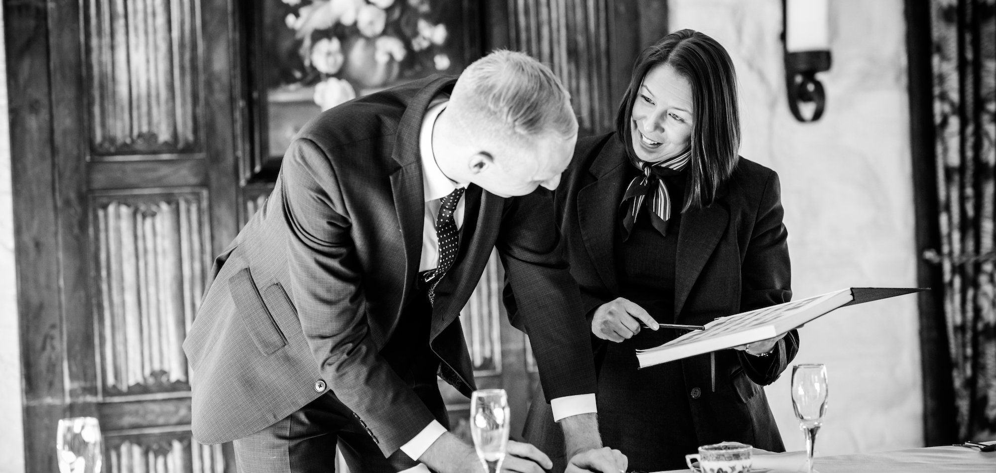 Wedding coordinators at Holdsworth House discussing the details of a wedding at Holdsworth House in Halifax.