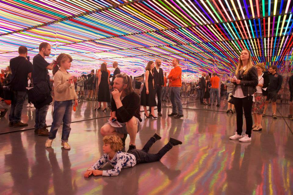 National Science and Media Museum children playing in the temporaroy light exhibition on a short family hotel break in Yorkshire
