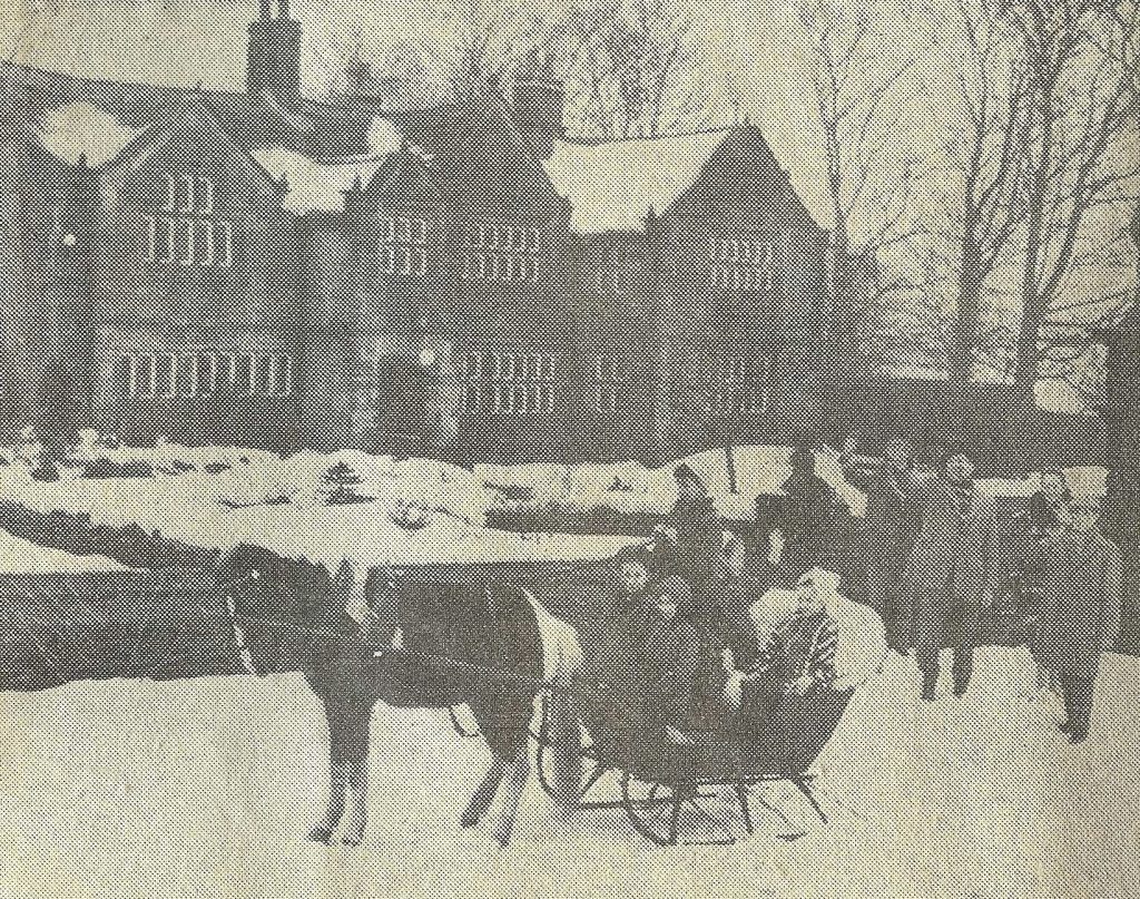 Holdsworth House director Gail Moss, her sister and friends in a horse drawn sleigh outside Holdsworth House in the winter of 1963