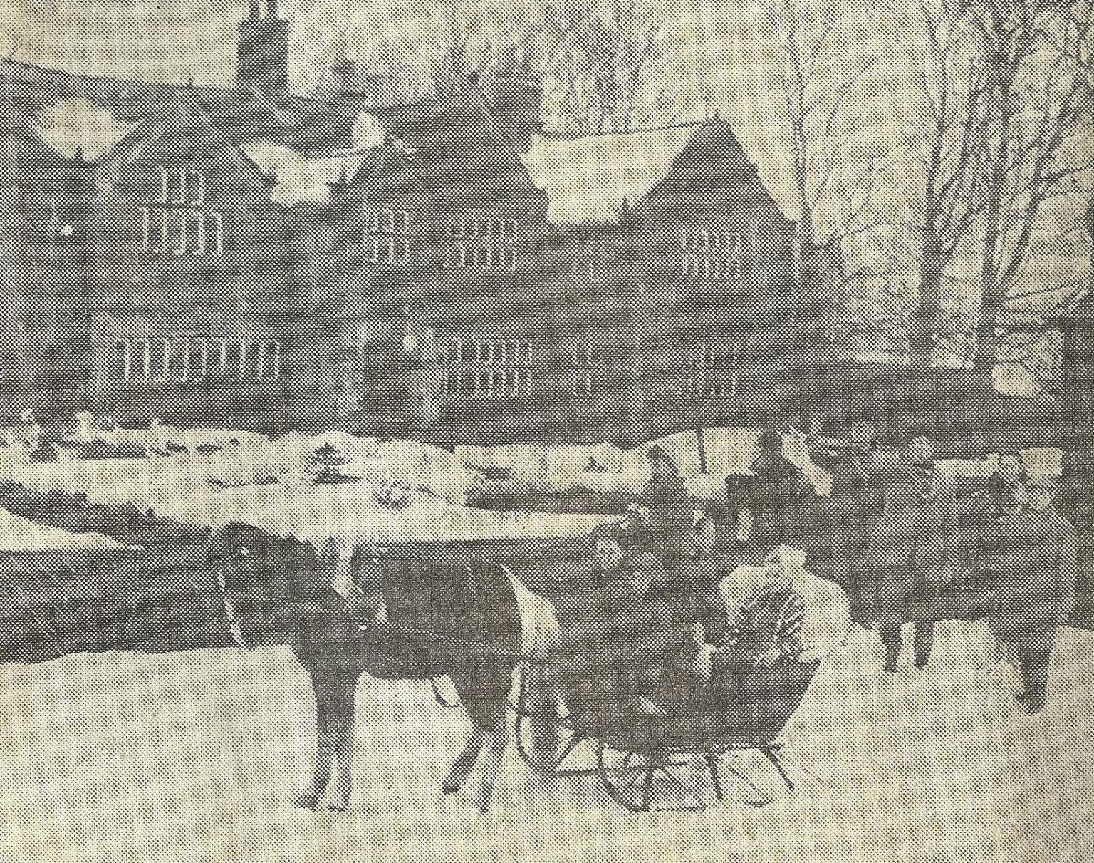 Holdsworth House director Gail Moss, her sister and friends in a horse drawn sleigh outside Holdsworth House in the winter of 1963