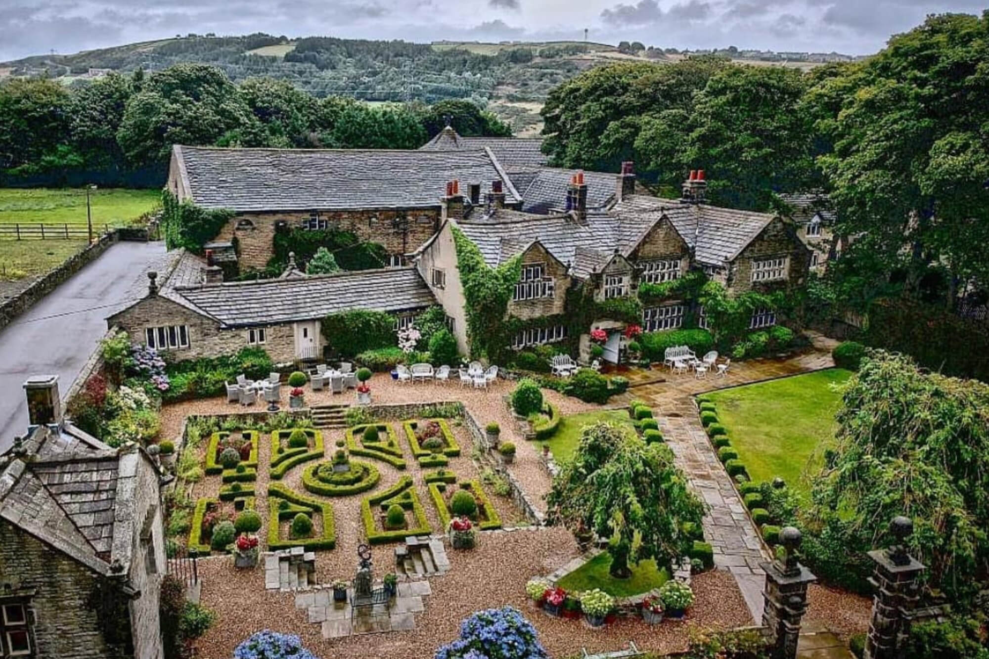 Aerial view of Holdsworth House and its formal gardens in West Yorkshire