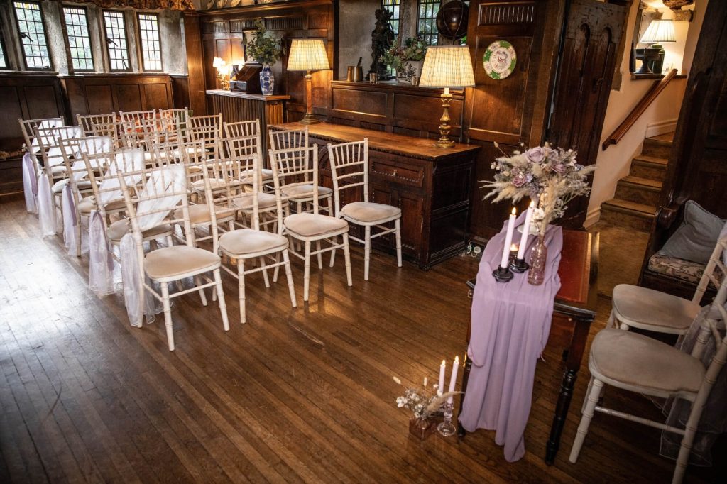 Wedding ceremony arranged in the main hall at Holdsworth House.