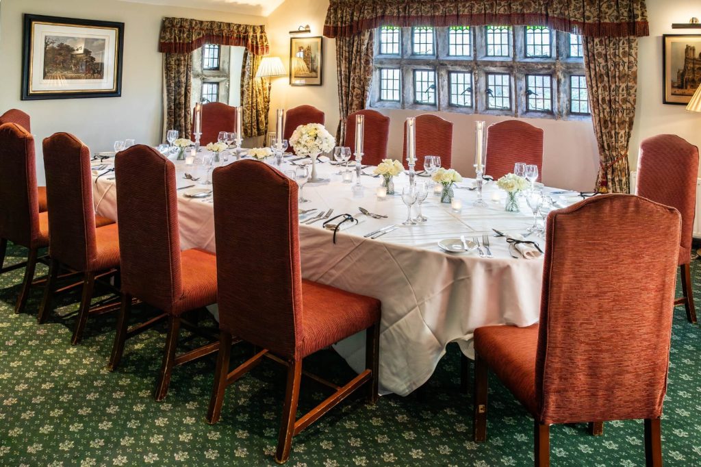 Wedding breakfast set up in a private dining room at Holdsworth House.