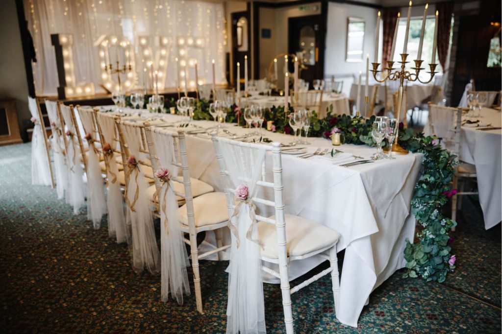 Wedding breakfast set up in the Stuart Room at Holdsworth House.