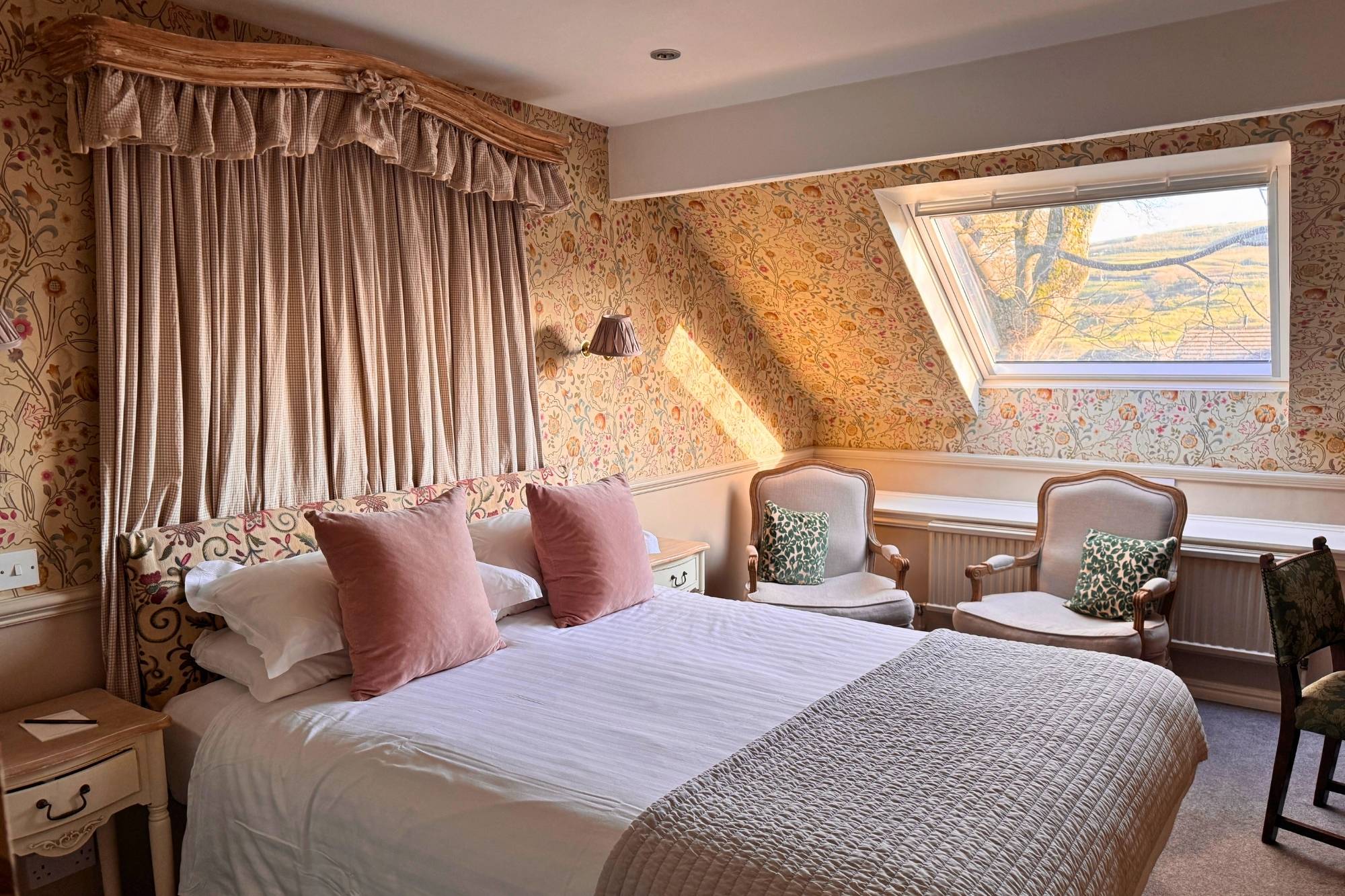 House Double bedroom at Holdsworth House with sloped ceiling and seating area