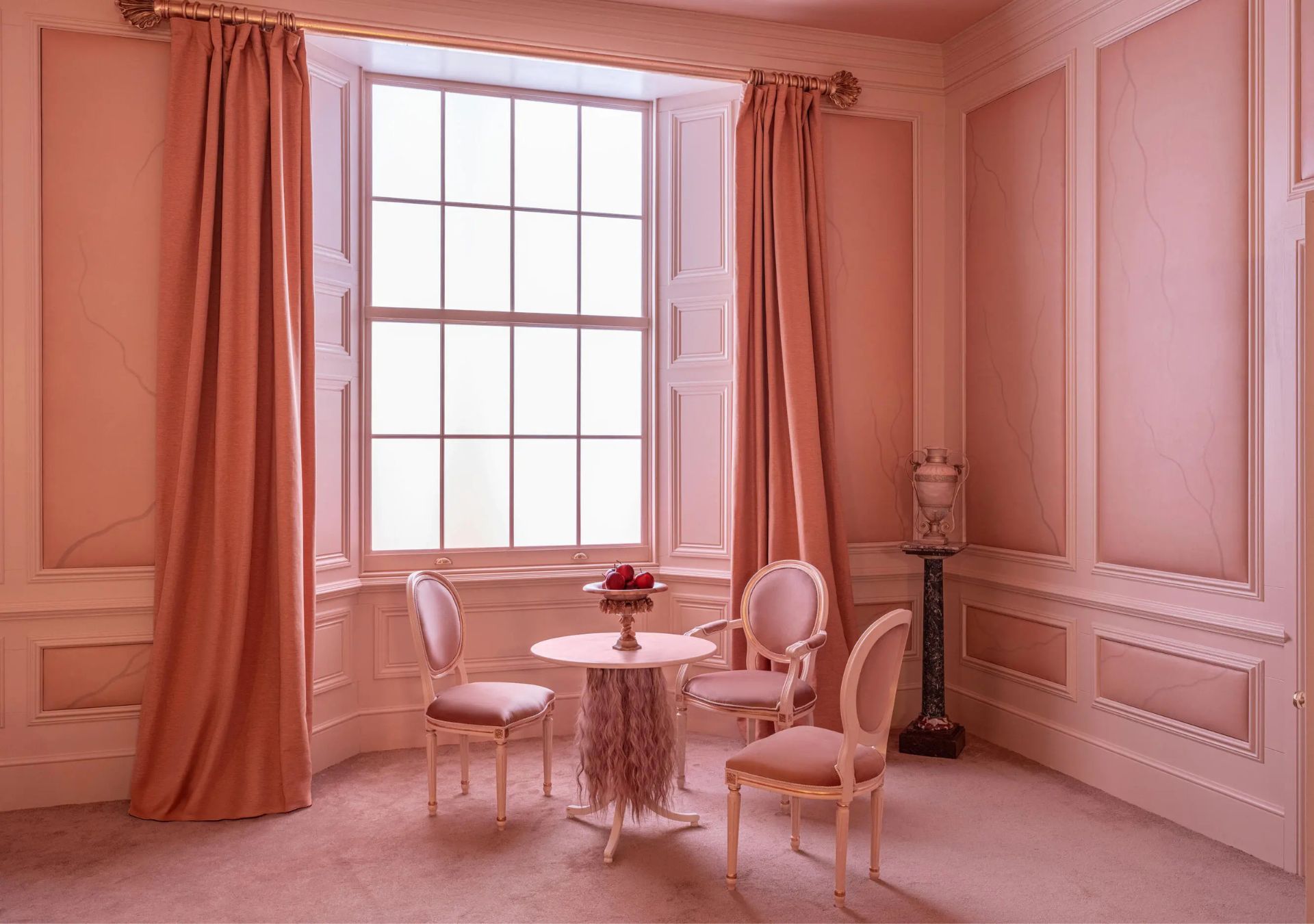Seating area within the replica of Cathy Earnshaw’s bedroom at Thrushcross Grange, created for the Airbnb Wuthering Heights experience