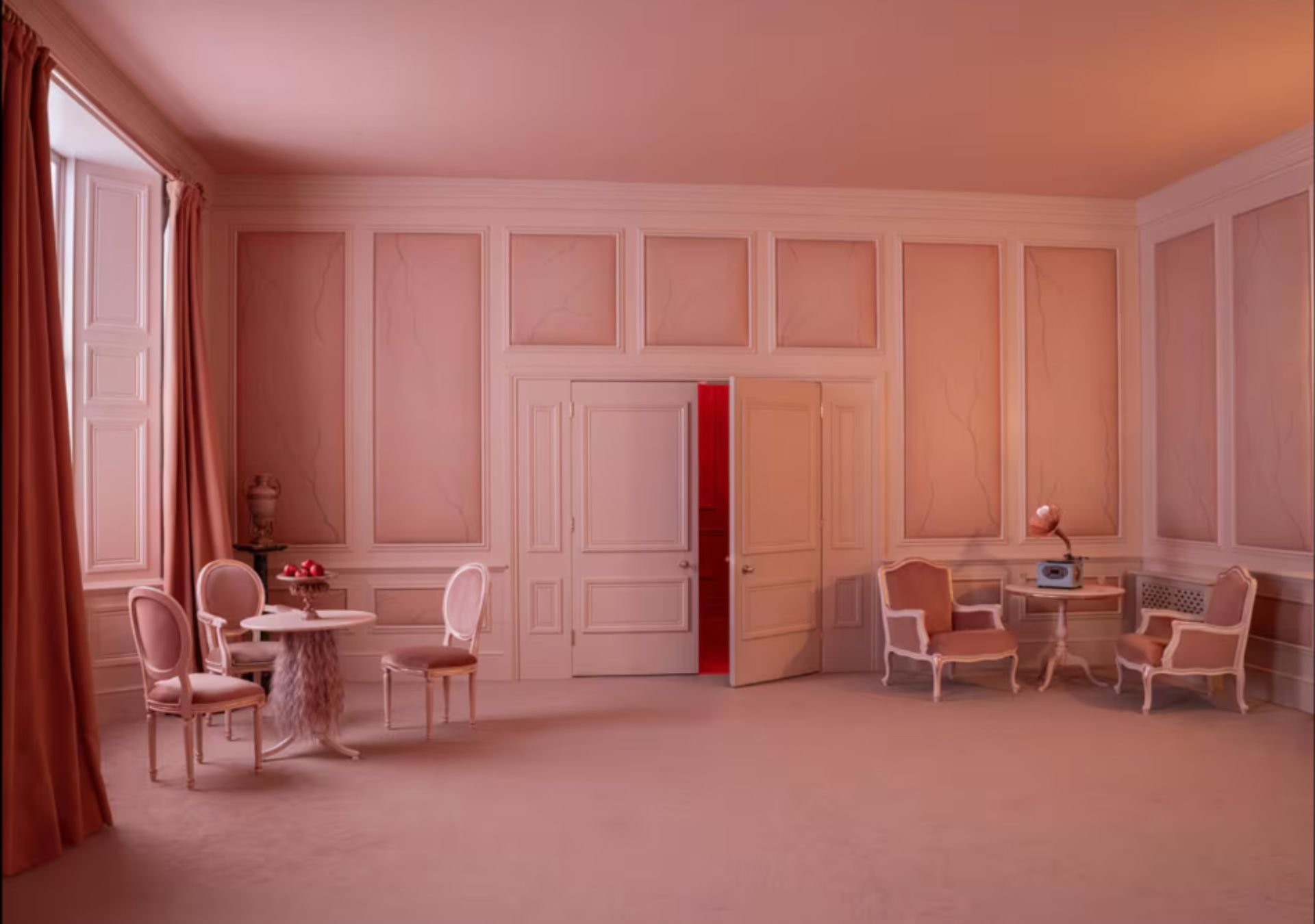 Wide interior view of the replica of Cathy Earnshaw’s bedroom at Thrushcross Grange with adjoining doorway