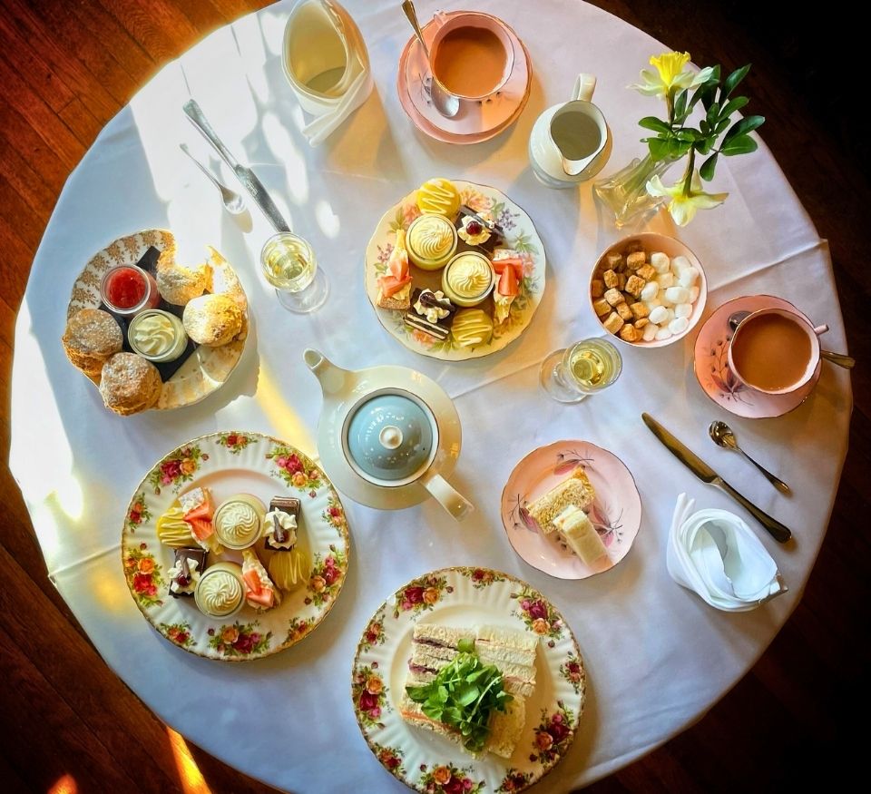 Romantic Valentine’s afternoon tea at Holdsworth House with sandwiches, cakes and tea served on vintage china.