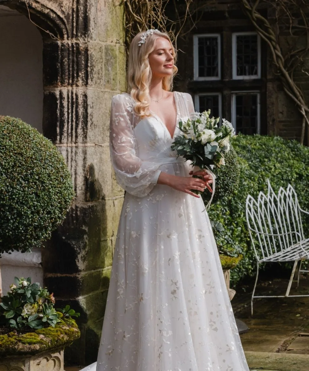 A happy couple on their wedding day at Holdsworth House