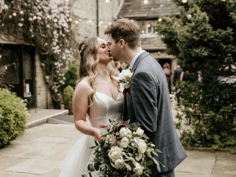 Garden wedding ceremony at Holdsworth House in West Yorkshire