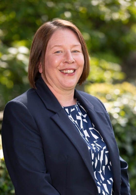 Claire, Head Wedding Coordinator at Holdsworth House, photographed in the gardens.