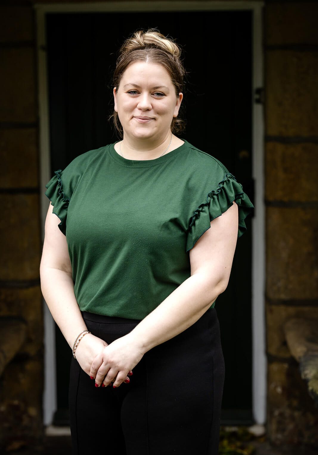 Claire Hutton Spa Manager standing outside the Farmhouse Treatment Rooms Holdsworth House Hotel Halifax