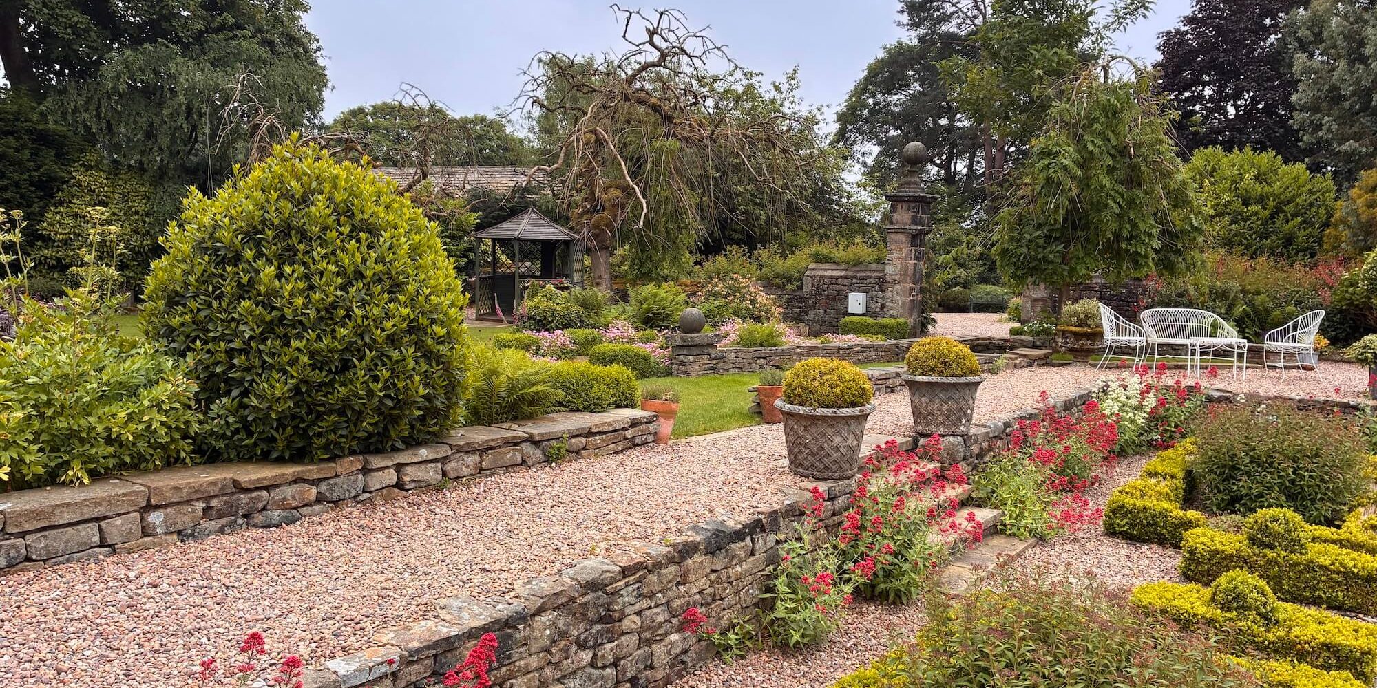The hotel gardens at Holdsworth House in summer